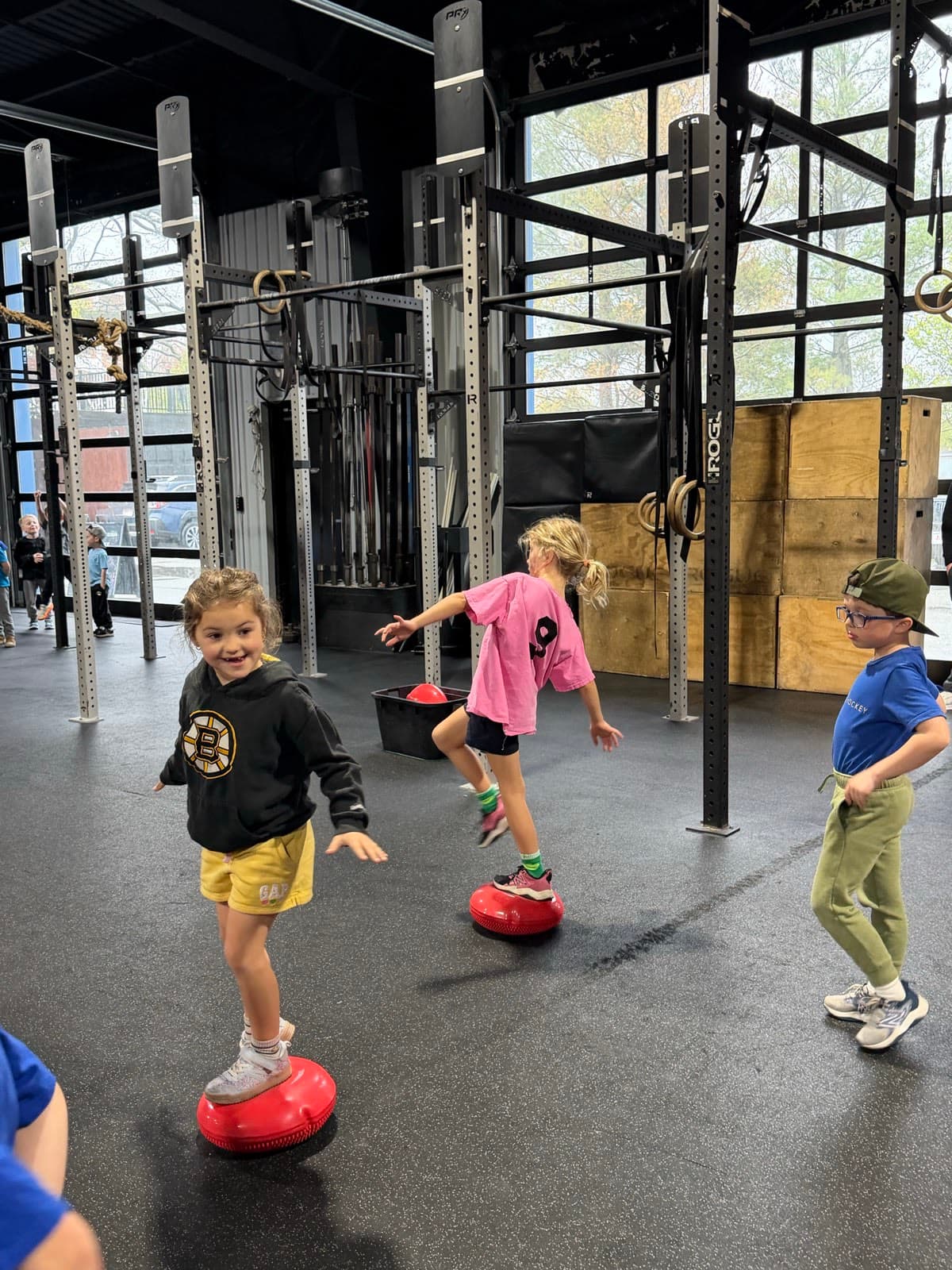 Kids balancing on dome trainers